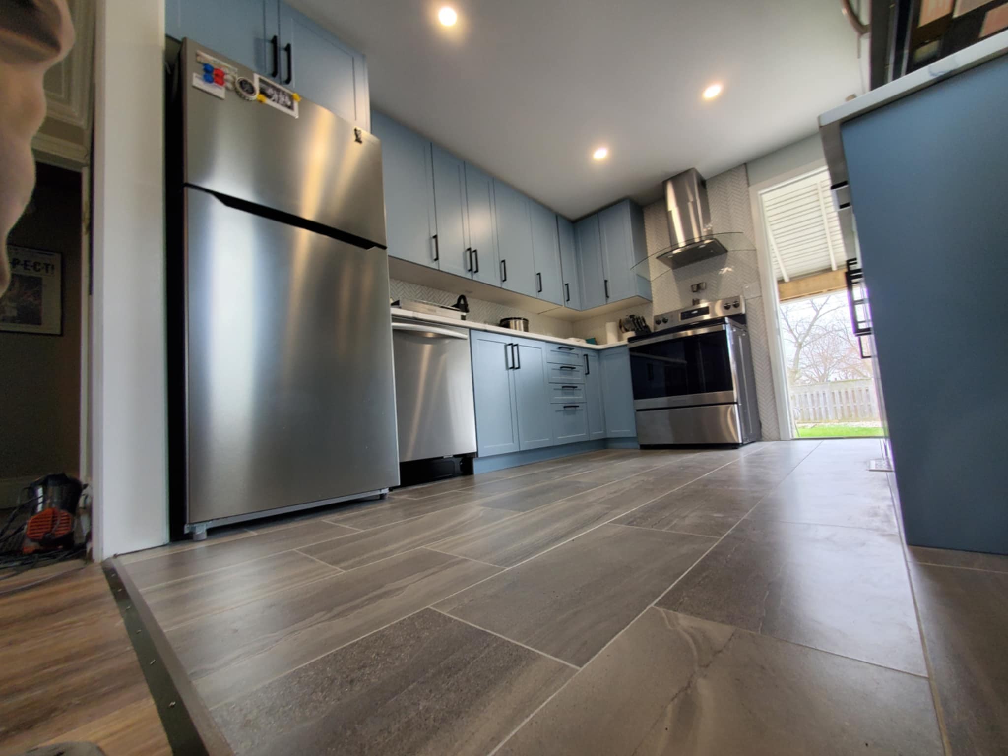 Covered deck with outdoor seating.